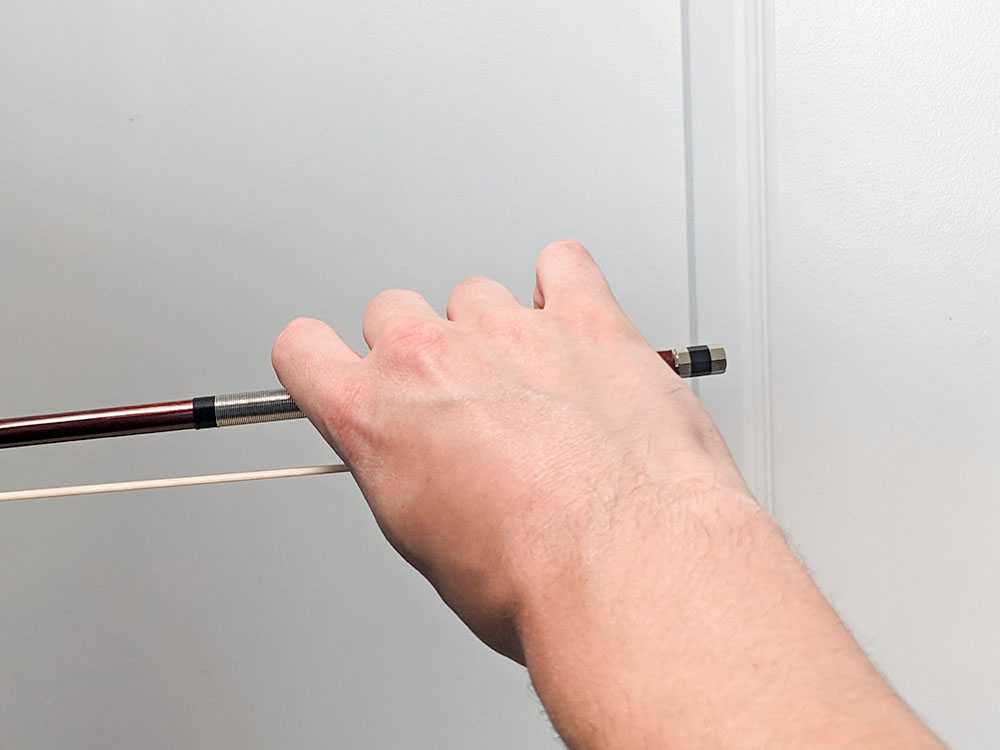 The correct violin bow hold from the back view.