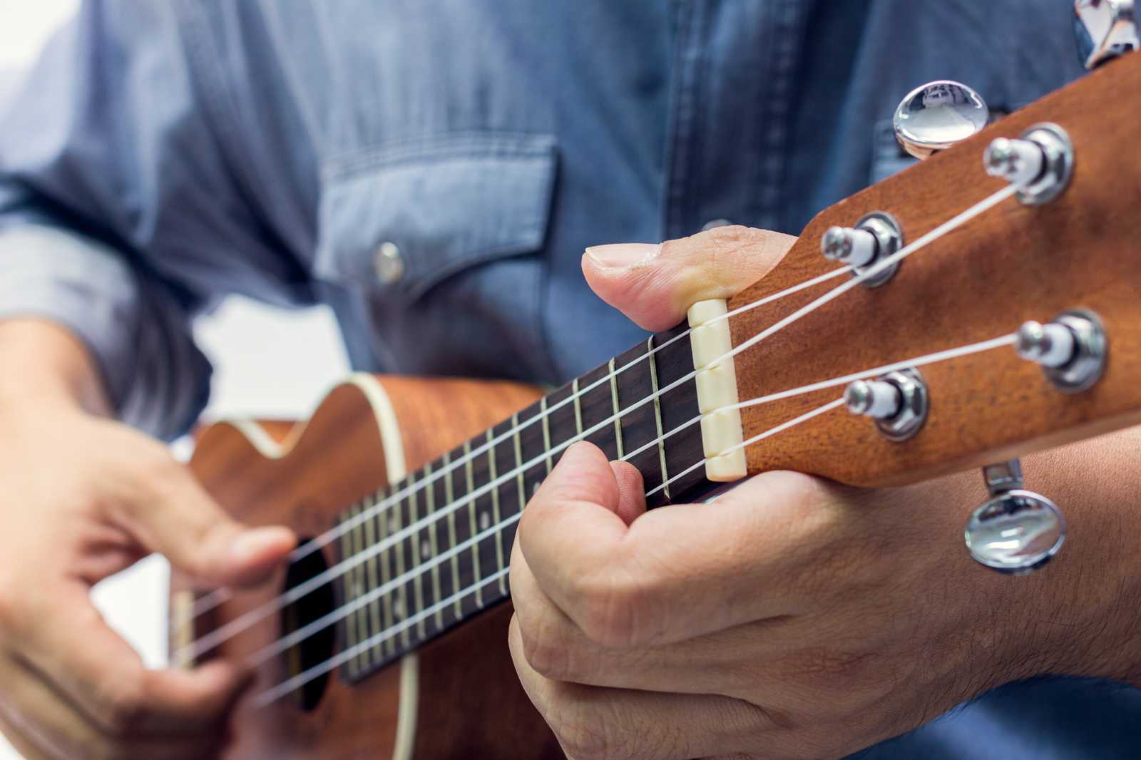 Man playing the ukulele