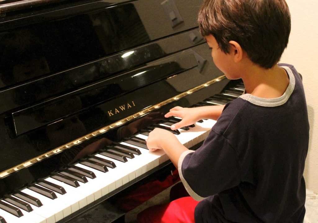 Kid Playing at Music School