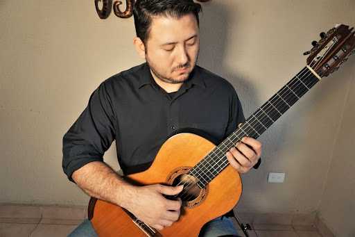 Position check, left hand on the guitar near the 12th fret