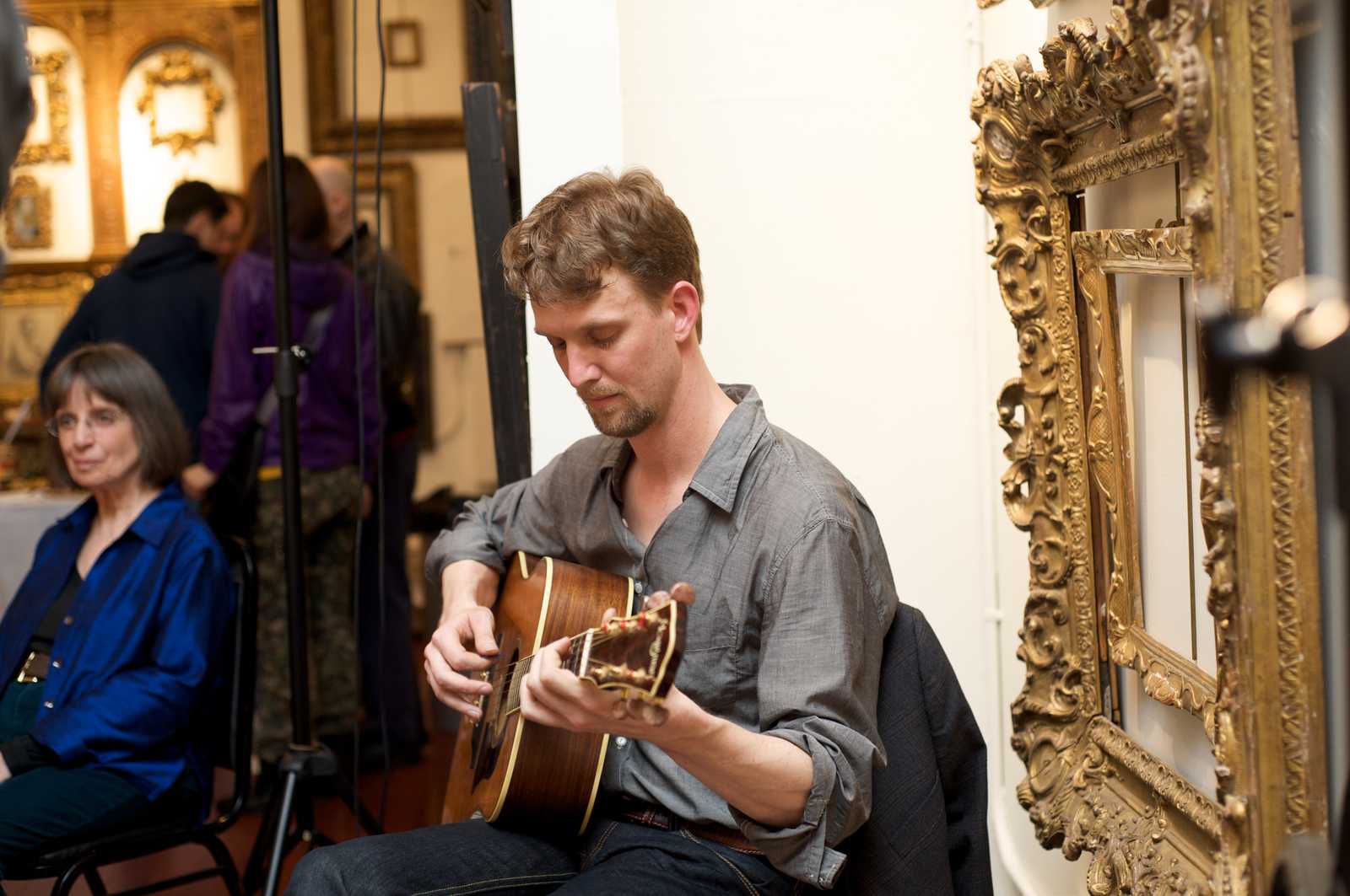 Sage playing the guitar