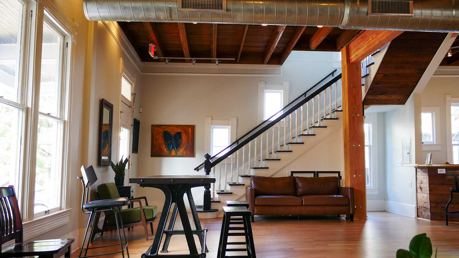 Sage Music waiting room with stairs and art