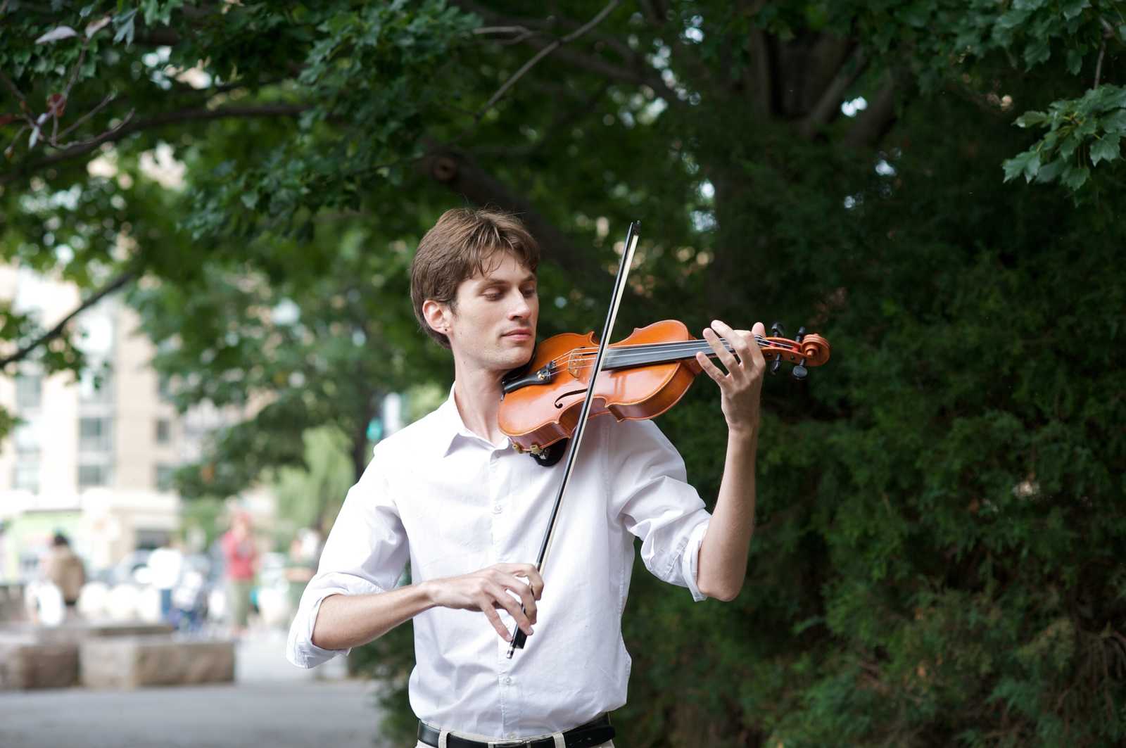 A man playing the violin