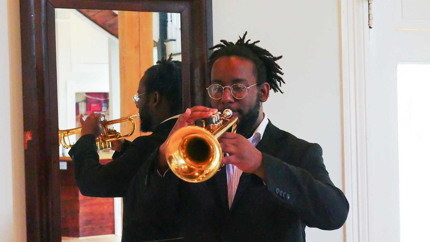 Sage Music trumpet teacher playing his instrument